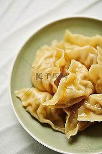 食品中国背景图片_白盘上的中国饺子