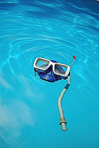 通气管背景图片_在游泳池里游泳的通气管