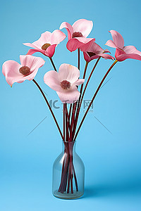 蓝色背景花瓶里的五朵粉红色的花