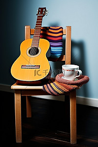 老板坐在椅子上背景图片_咖啡杯和吉他坐在椅子上