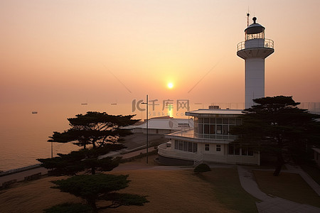 南海观音背景图片_韩国南海公园灯塔日出