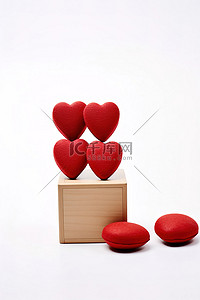 四颗心背景图片_木箱旁边的四颗红心