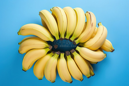 福利蓝色背景图片_蓝色背景上一圈围成一圈的香蕉
