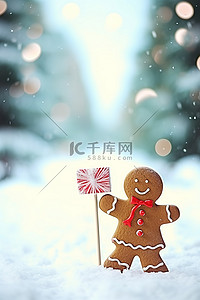 立着的牌子背景图片_一个姜饼人在冬雪中举着牌子