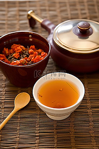 黑果枸杞背景图片_乌龙茶旁边有一壶枸杞汁