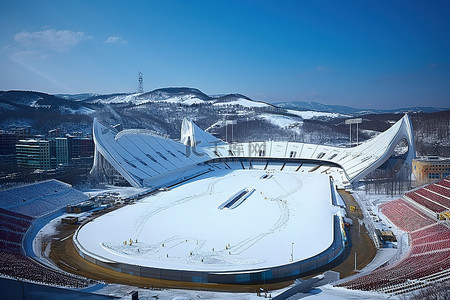 跳台滑雪滑雪背景图片_韩国冰雪覆盖的山腰奥林匹克体育场