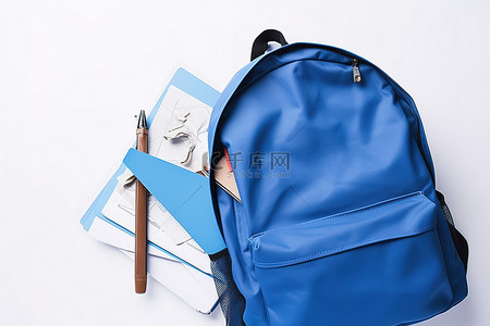 背包蓝色背景图片_一个蓝色背包，里面有纸笔记本纸和剪刀
