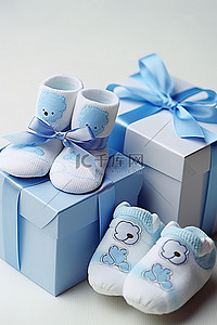 蓝色新生背景图片_新生男婴婴儿及靴子礼盒婴儿蓝蓝色主题