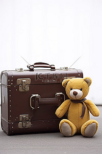 棕色玩具背景图片_泰迪熊和复古棕色手提箱
