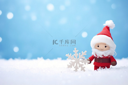 冬天白色雪花背景图片_圣诞老人娃娃上方白色雪花的图像