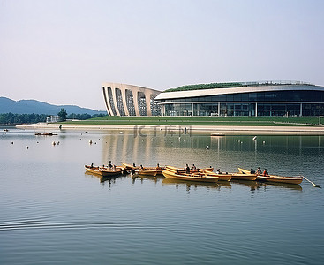 综合背景图片_奥林匹克体育场前的水面上停泊着几艘船