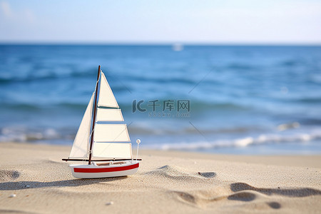 海边沙滩上的一艘帆船