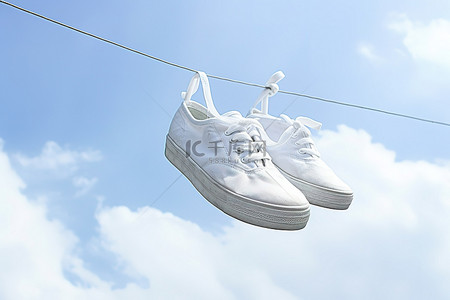 白色运动鞋挂在天空的绳子上