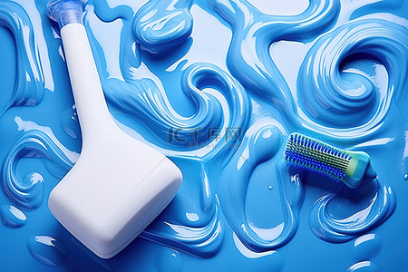 地板上的蓝色牙膏刷和牙刷