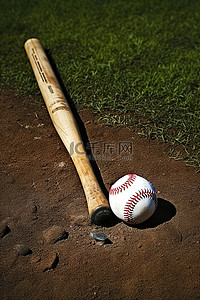 棒球棒背景图片_棒球棒在地上与球