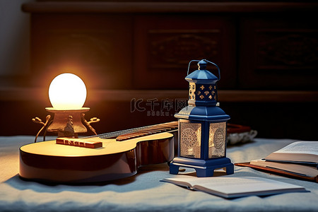 尤克里里背景图片_吉他乐谱和桌子上的灯笼