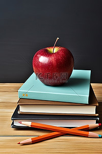 一摞书上的红苹果