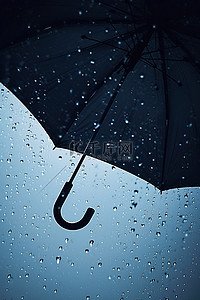 撑伞背影背景图片_雨中撑着的伞