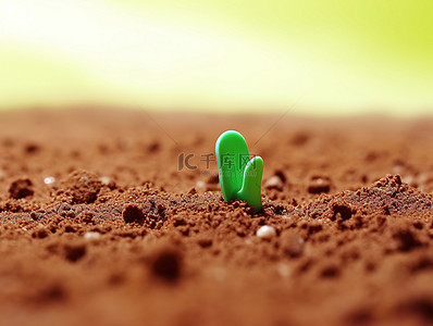 绿芽背景图片_一粒绿芽在泥土里发芽