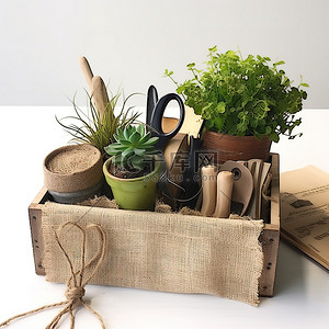 质朴的花背景图片_质朴的粗麻布盒，配有植物和园艺工具