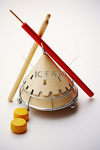手鼓背景图片_三角鼓，带有木棍和木棍
