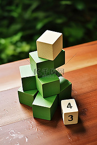 j字母logo背景图片_木凳上放着一堆积木