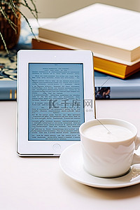 英语书在桌子上背景图片_ipad 躺在沙发上的桌子上，旁边是书和一杯茶