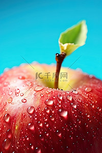 咬水果背景图片_一个有水滴的苹果