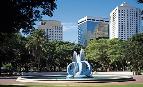 公园广场背景图片_佛罗里达州南部的广场设有喷泉和植物
