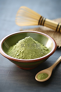绿色抹茶背景图片_绿色粉末和一碗搅拌器