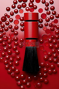 红色的刷子背景图片_上面有一个物体的刷子位于红色珠子上方