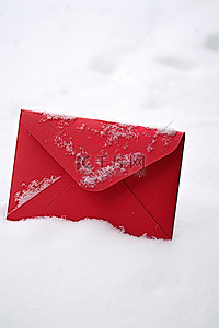 圣诞节雪背景图片_雪中​​的红包