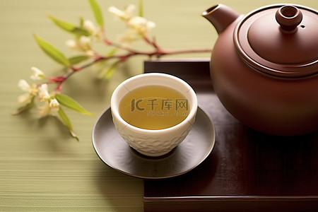 绿茶茶叶背景图片_一杯煎茶绿茶