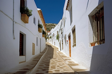 狭窄背景图片_白色建筑中的狭窄街道