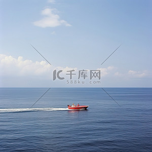 红色的船背景图片_一艘红色的船在公海上