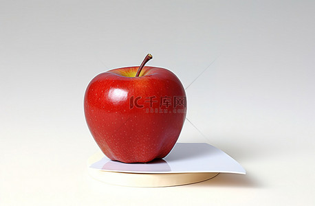 珠宝名片背景图片_一个红苹果，上面有白色的贷方票据