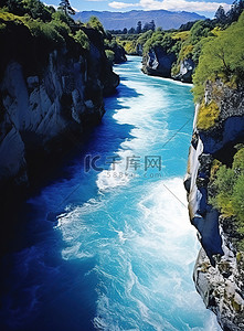 古诗瀑布背景图片_一条蓝色的河流，两边都是岩石和悬崖