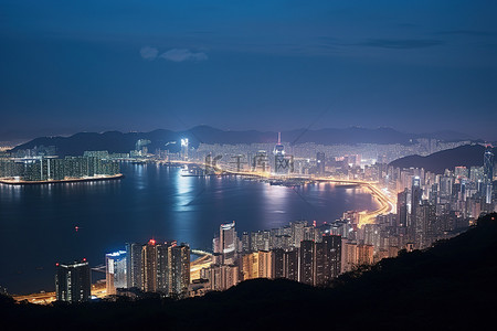 海洋旅行背景图片_晚上从山顶看香港天际线