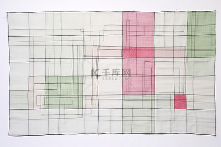 被子背景图片_由粉色和绿色布料制成的拼布被子