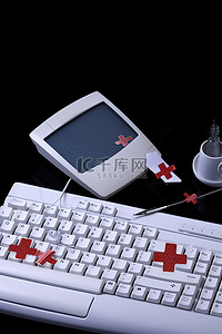 计算机屏幕上的一些医疗设备和连接到键盘的针