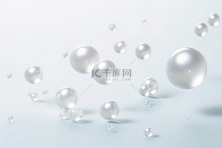 白色宝石背景图片_浅色背景中漂浮在空中的几颗珍珠
