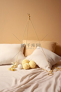 枕头上背景图片_这是一张床上，里面放着枕头和一缕纱线