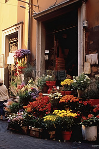 街边背景图片_人和物品是一家街边的小花店
