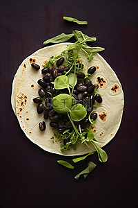 乌龙黑米茶背景图片_黑米卷饼上的黑豆和鼠尾草