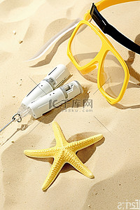 通气管背景图片_黄色和白色的通气管和海星躺在沙滩上
