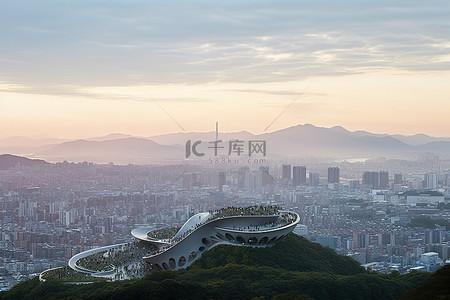 塔机图片背景图片_首尔市从山上看日落日出图片