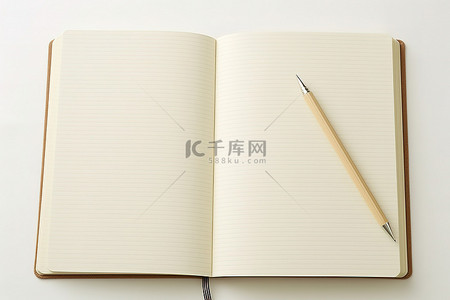 空白笔记本背景图片_隔离的空白笔记本和铅笔