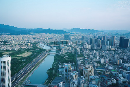 城市河流背景图片_城市景观展示了许多大型建筑河流和山脉