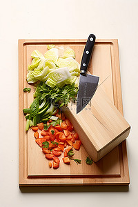 一块木板背景图片_一块木板，上面有蔬菜和一把刀
