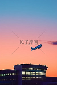 机场大巴背景图片_一架飞机飞越机场和建筑物
